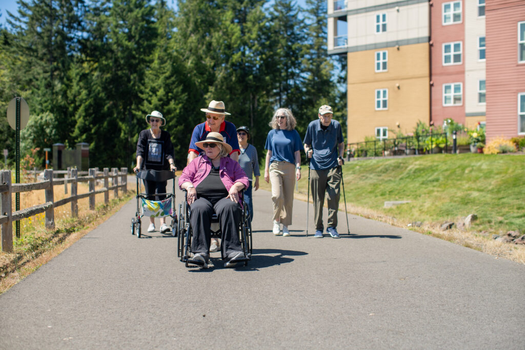 Residents of our different levels of care enjoy a walk around the pond that surrounds Heron's Key.