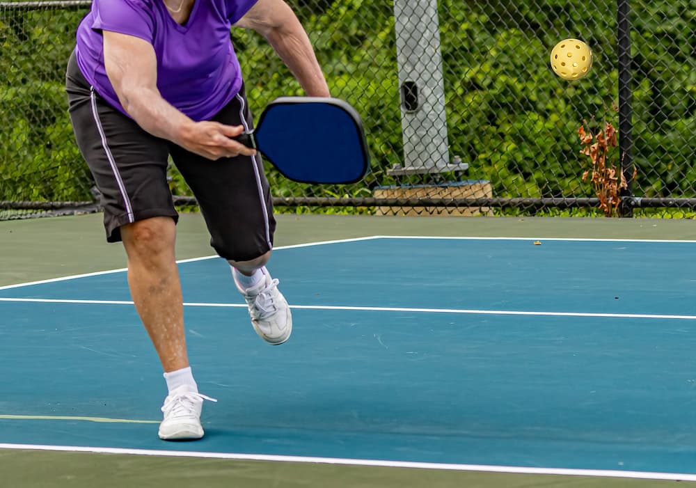 seniors playing pickleball